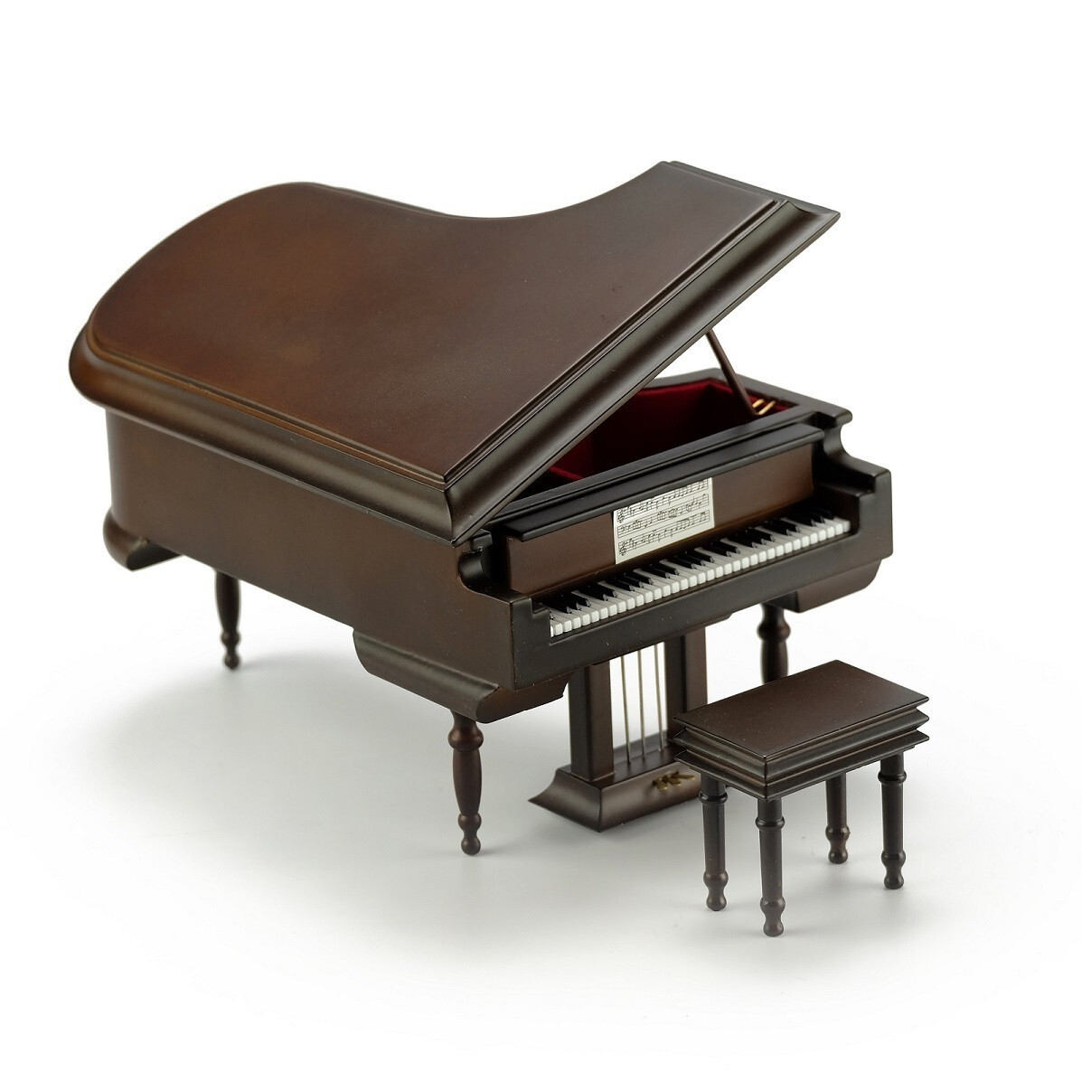 brown miniature musical piano with bench