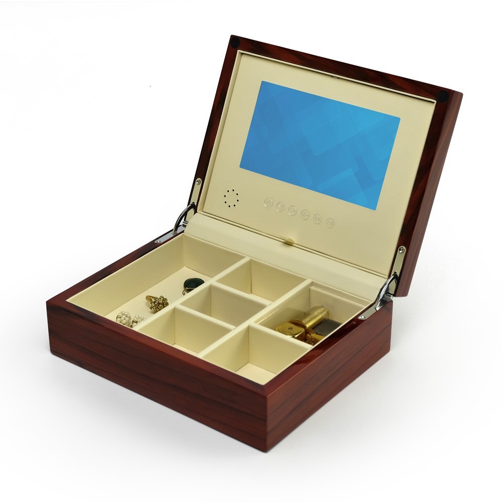 LCD music box with screen and room for jewelry