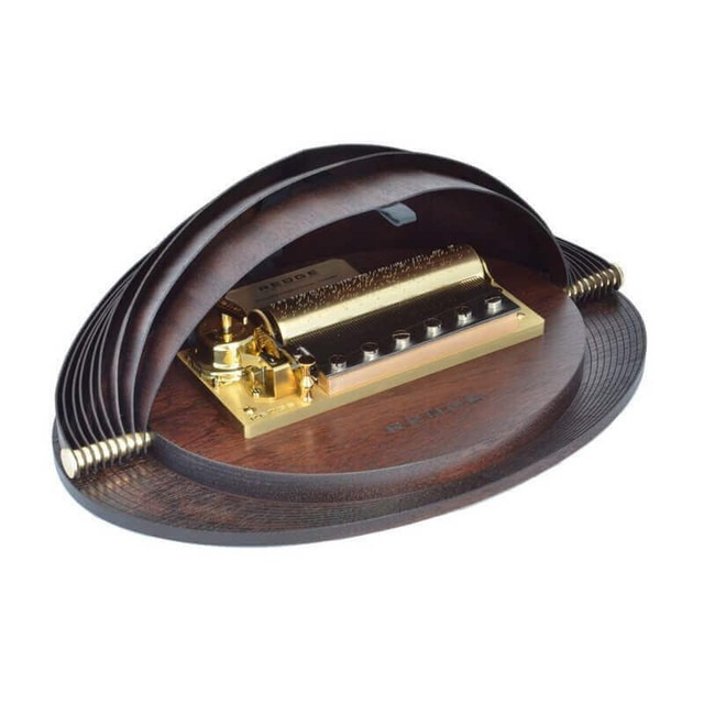 reuge brand music box that looks like the sydney opera house